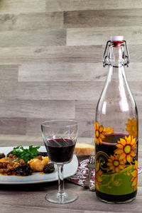 Wine glass bottles on table