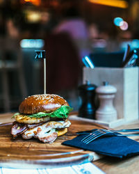 Close-up of hamburger on cutting board