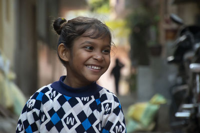 Portrait of happy indian young girl