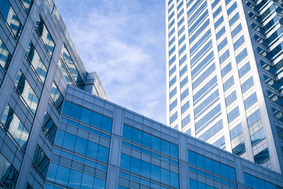 Low angle view of skyscrapers against sky