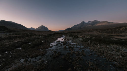 Scenic view of mountains against sky during sunset