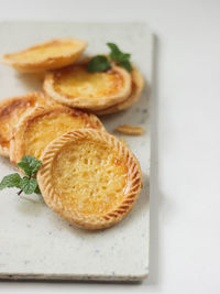 Cake of pie. custard tarts or pie susu on marble board . selective focus