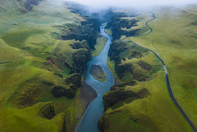 Aerial view of fjadrargljufur volcanic canyon iceland on moody overcast weather