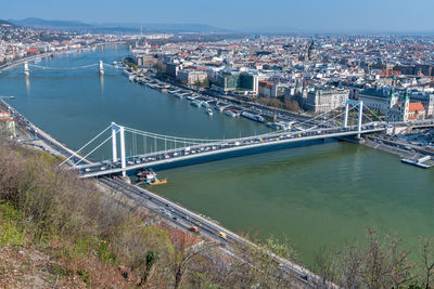 High angle view of suspension bridge over river