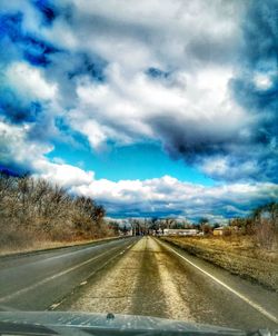 Highway seen through car windshield