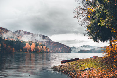 Scenic view of lake against sky during autumn