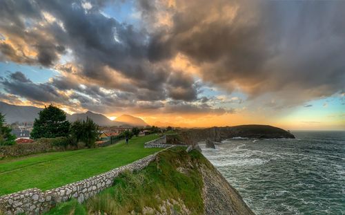 Scenic view of sea against sky during sunset