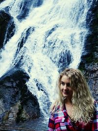 Portrait of woman smiling in water