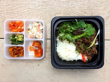 High angle view of food served on table