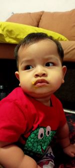 Portrait of cute baby at home