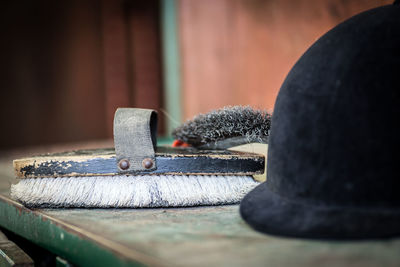 Close-up of brush on table