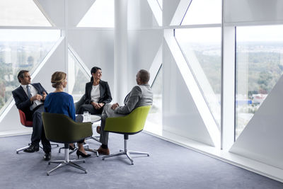 Businessman and businesswomen talking