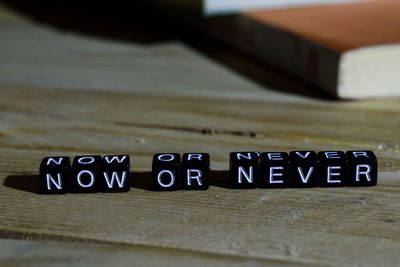 Close-up of text on table
