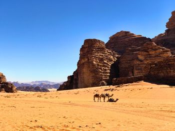Scenic view of desert against clear sky