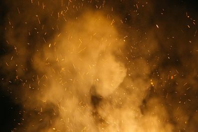 Full frame shot of firework display at night