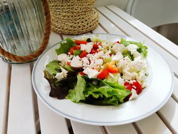 High angle view of salad in bowl on table