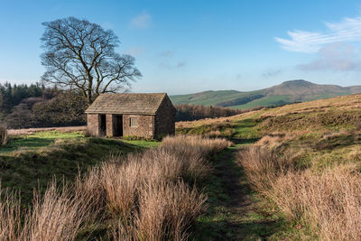 Scenic view of land against sky