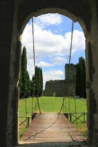 Internal courtyard of a castle view from the drawbridge of the main entrance, tuscany, italy