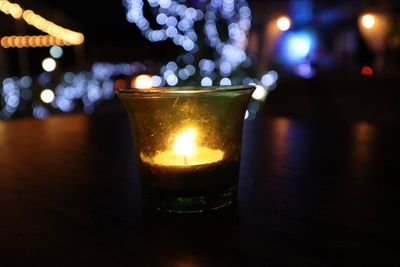 Close-up of tea light candle on table