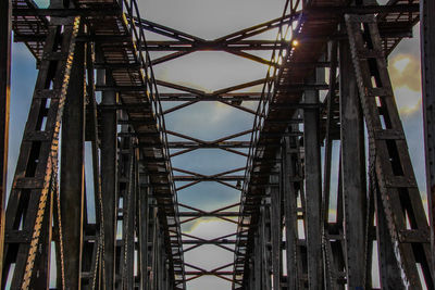 Low angle view of old bridge against sky