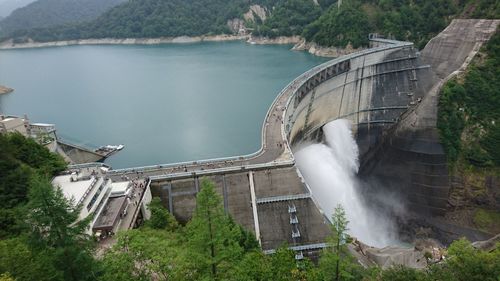 High angle view of dam amidst trees