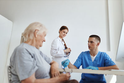 Group of people sitting in room