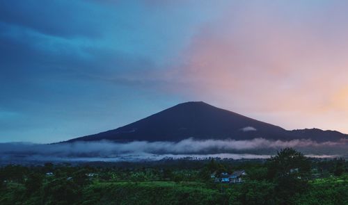 Scenic view of mountains against sky during sunset