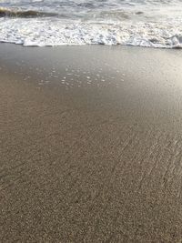 Close-up of sand on beach