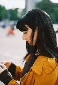 Close-up side view of young woman