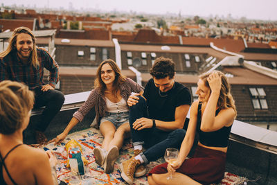 Group of people sitting outdoors