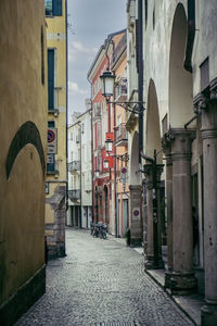 Narrow street along buildings