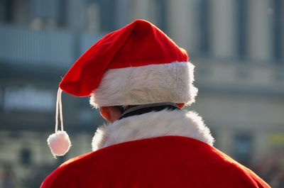 Rear view of man in santa claus costume
