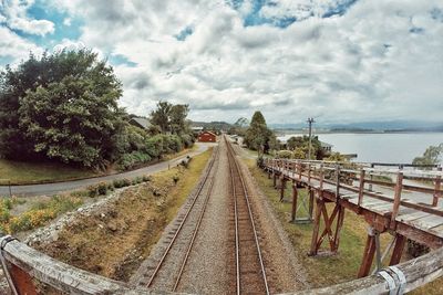 View of road against cloudy sky