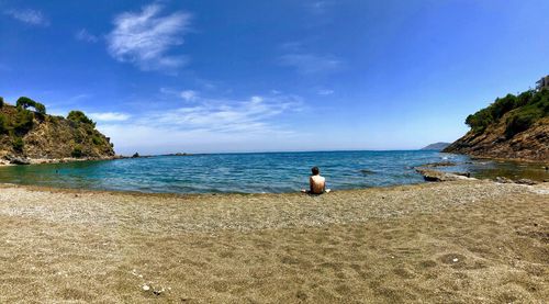 Scenic view of beach against sky