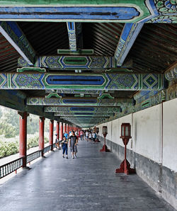 People walking on footbridge