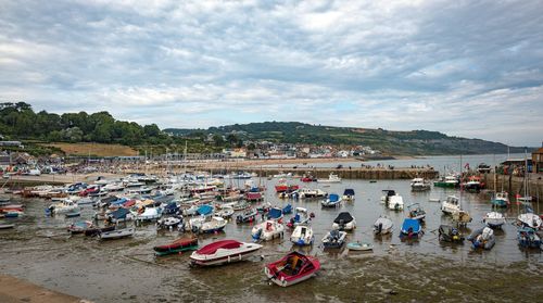 High angle view of boats moored on beach against sky