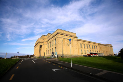 View of historical building against cloudy sky