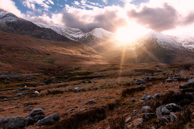 Scenic view of landscape against sky during sunset