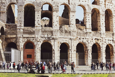 Group of people in front of historical building