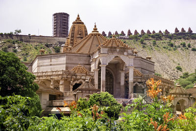 Artistic red stone jain temple at morning from unique angle