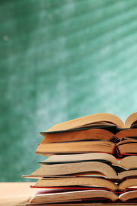 Close-up of books against wall