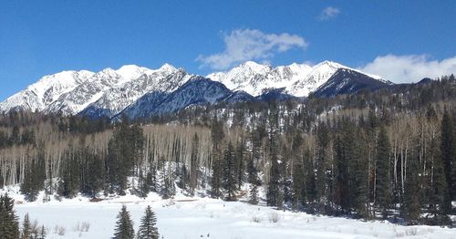 Scenic view of snow covered mountains