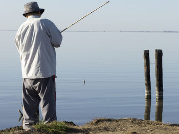 Portrait of fisherman fishing