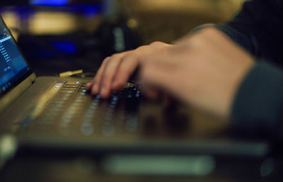 Close up of a hands of a businessman on a keyboard. 