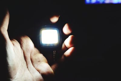 Close-up of man holding camera