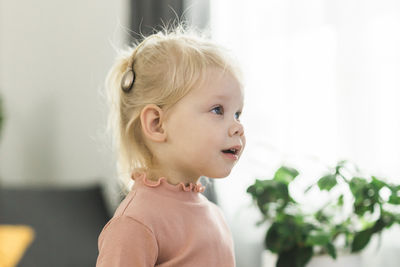 Close-up of girl looking away