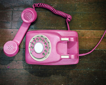 High angle view of telephone on table