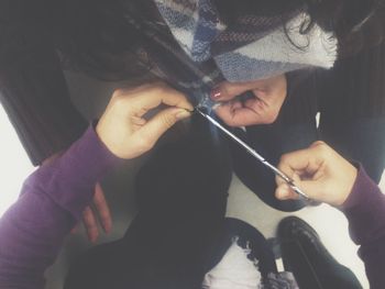 Close-up of man holding hands