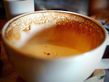 Close-up of coffee cup on table