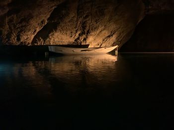 Scenic view of sea seen through cave